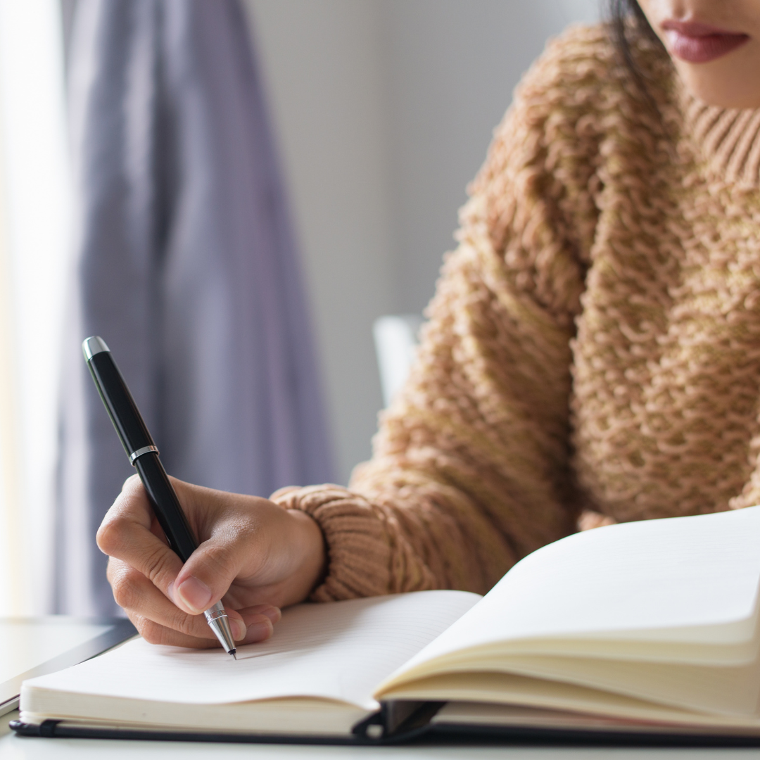 Writing in planner with yearly overview